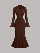 Elegant Long-Sleeve Mermaid Dress with a High Collar And Bow Tie, Fitted for Gatherings And Accentuating Curves.