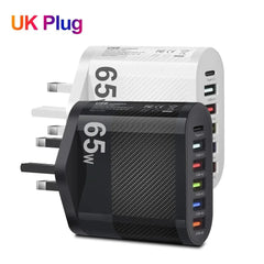 Two 65W USB wall chargers with UK plugs, one white and one black, featuring multiple ports.
