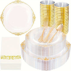 A set of clear plastic plates, gold-toned cutlery, cups, and napkins for party dining.