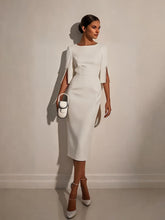 A woman wears a white midi-length bodycon dress with half sleeves featuring pearl button details.