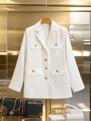 A white long-sleeved blazer with a lapel collar, four flap pockets, and gold-toned buttons.