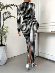 A woman wears a long-sleeved, bodycon houndstooth dress with a back slit and crew neck.