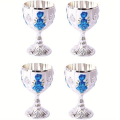 A set of four small silver-toned metal goblets featuring embossed blue rose floral patterns.