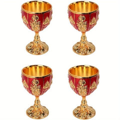 A set of four small, vintage-style metal goblets featuring red enamel and gold embossed floral art.