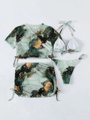 A four-piece bikini set featuring a green and gold marble print with a cover-up top and skirt.