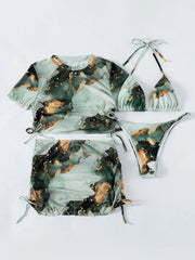 A four-piece bikini set featuring a green and gold marble print with a matching top and skirt.
