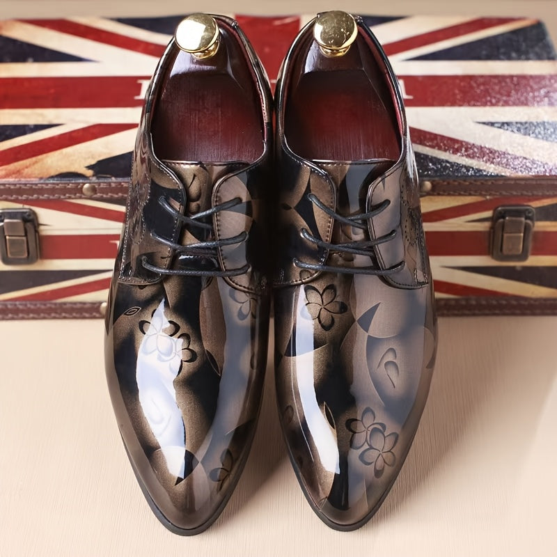 A pair of men's pointed-toe faux leather oxford shoes featuring a glossy floral pattern.