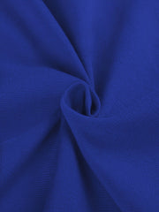 A close-up view of royal blue knit fabric with a subtle texture and soft folds.