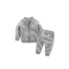 A grey baby boy sports set featuring a zip-up bomber jacket and matching pants with white stripes.