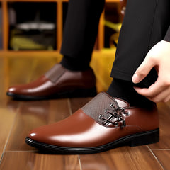 Brown men's business casual slip-on loafers featuring a rounded toe and mesh detailing.