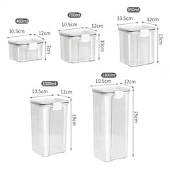 Five clear plastic rectangular storage containers of varying heights with airtight lids.