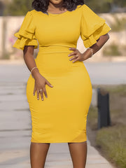 A woman wears a solid yellow midi pencil dress featuring a round neck and tiered ruffle sleeves.