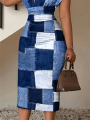 A woman wears a slim-fit, V-neck midi dress featuring a blue and white patchwork denim print.