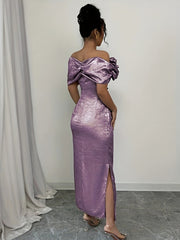 A woman wears a shimmering lavender off-shoulder bodycon maxi dress with a side slit.