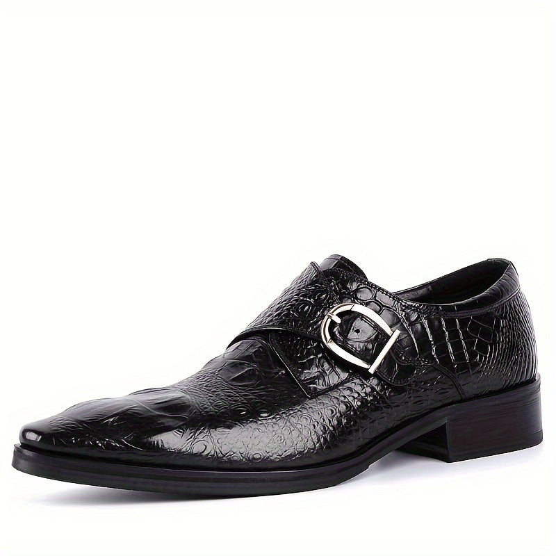 A black crocodile-print leather loafer with a pointed toe and a silver metal side buckle.
