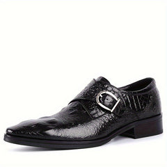 A black crocodile-print leather loafer with a pointed toe and a silver metal side buckle.