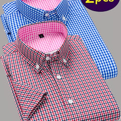 Two men's short-sleeve button-up shirts in red and blue gingham patterns.