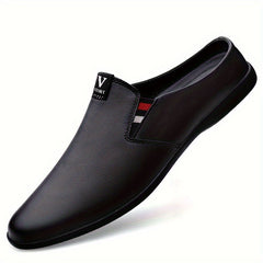 A black leather slip-on mule for men with a round toe and a small red and white side accent.
