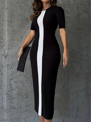 A woman wears a black bodycon midi dress featuring a vertical white stripe down the center.