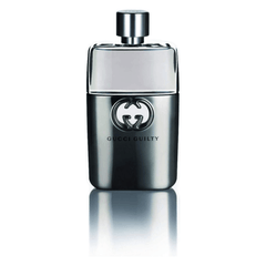 A metallic silver bottle of Gucci Guilty Pour Homme eau de toilette with the iconic logo.