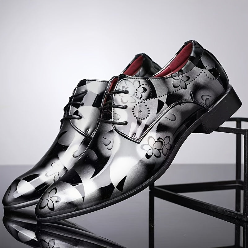 Men's pointed-toe faux leather oxford dress shoes featuring a black and silver floral pattern.