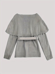 A grey long-sleeve knit sweater featuring a pleated cape overlay and a matching waist belt.