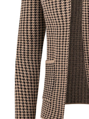 A slim-fit knit cardigan featuring a tan and black houndstooth pattern and long sleeves.