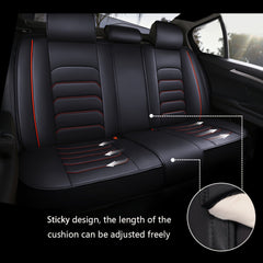 Black faux leather rear car seat covers with red accents and an adjustable length design.