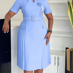 A light blue V-neck dress with a belted waist, short sleeves, and a pleated skirt.