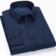 A long-sleeved, slim-fit men's dress shirt in navy blue with thin vertical light blue stripes.