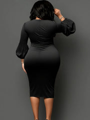 A woman wears a black long-sleeved bodycon midi dress with a fitted silhouette.