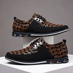 Men's black and brown geometric print lace-up casual shoes with white rubber soles.