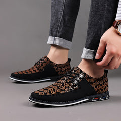 Men's casual lace-up shoes featuring a black and brown geometric pattern with a white rubber sole.