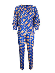 A two-piece set featuring a long-sleeved shirt and casual pants with a blue and tan plaid print.