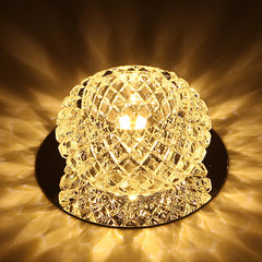 A modern surface-mounted crystal LED ceiling light with a textured, diamond-patterned glass shade.