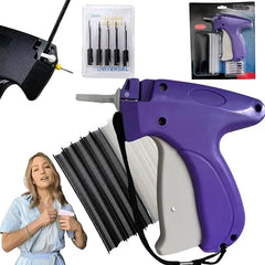 A purple clothing fixer tagging gun with replacement needles and plastic fasteners.