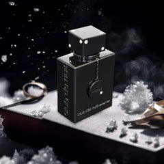 A black rectangular bottle of Armaf Club de Nuit Intense Man perfume with a dice-shaped cap.