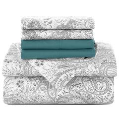 A six-piece sheet set featuring a grey and white paisley print paired with solid teal sheets.