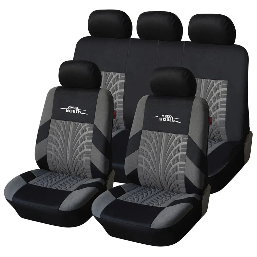 AUTOYOUTH Fashion Tire Track Style Universal Car Seat Covers, made from durable polyester, fit most vehicles. Includes covers for two front seats, one rear bench seat, and headrests in black and gray.