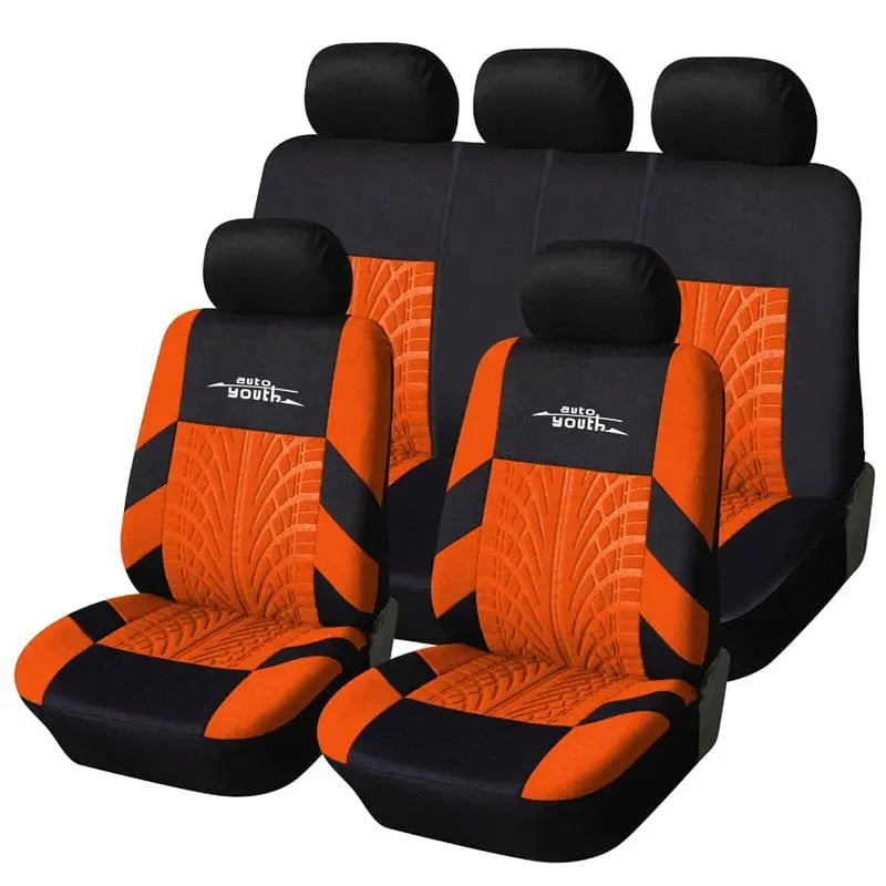 AUTOYOUTH Fashion Tire Track Style Universal Car Seat Covers in black and orange, made from durable polyester, fit most vehicles and protect both front and rear seats with a unique tire tread pattern.