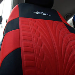 Close-up of an AUTOYOUTH Fashion Tire Track Detail Style Universal Car Seat Cover in red and black, made from durable polyester, fitted on a car seat to combine style and protection. Suitable for most vehicles; available in 4 colors.