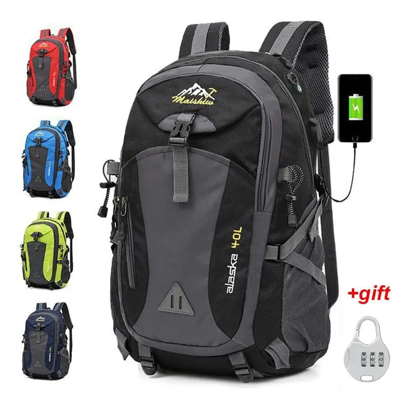 Five men's Anti-theft Mountaineering Waterproof Backpacks are shown: the main black and gray one with a USB charging port, plus smaller red, blue, green, and dark blue versions. A gift combination lock is included. Perfect for camping, hiking, or travel.