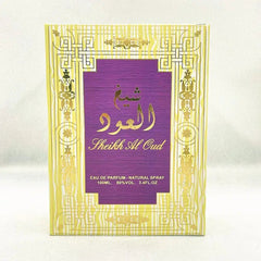 A rectangular box of Sheikh Al Oud eau de parfum featuring a purple center and yellow border.