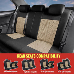 A set of black and tan tire-tread patterned car seat covers installed on a rear bench seat.