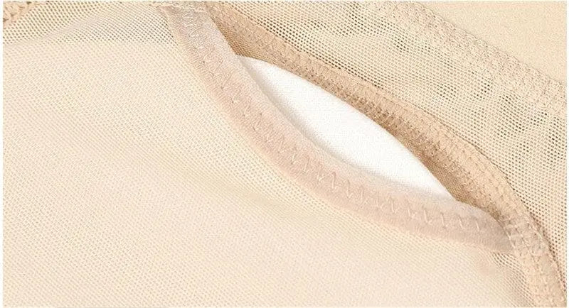 Close-up of beige mesh fabric with stitched seam and opening, revealing a white inner layer from Body Shapers Butt Lifter Faja Plus Size Slimming Tummy Control Lace Decorated Padded Panties for Women.