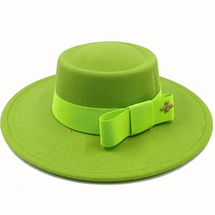 A bright lime green fedora hat with a flat top and a matching ribbon bow featuring a gold bee pin.