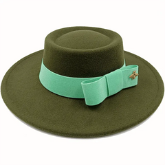 An olive green felt fedora hat with a flat top and a mint green elastic bow band featuring a gold bee.