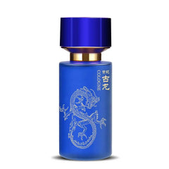 A blue frosted glass perfume bottle features a gold dragon illustration and a matching blue cap.