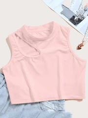 The Chic Off-Shoulder Crop Top is a light pink sleeveless crop top with a high neckline and one-shoulder cut-out, shown flat with light denim shorts and accessories—ideal for effortless summer style.