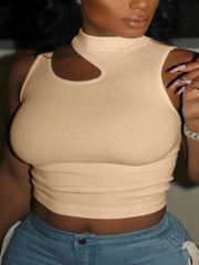 A woman models the Chic Off-Shoulder Crop Top in beige, featuring a choker neckline and cut-out details, paired with high-waisted blue jeans. Her light purple nails and partially hidden face complete this summer-ready look.